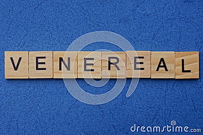 Word venereal made from brown wooden letters Stock Photo