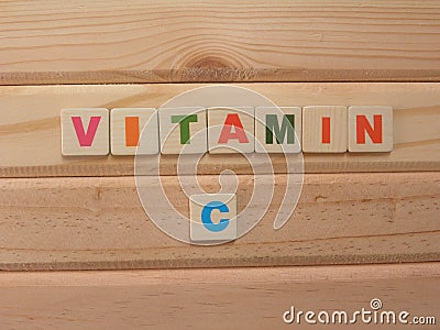 Word Vitamin C on wood Stock Photo