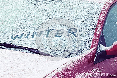 Word Winter written on a car windshield Stock Photo