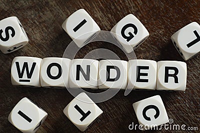 Word wonder on toy cubes Stock Photo