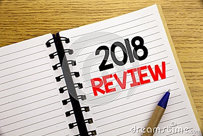 Word, writing 2018 Review. Business concept for Feedback On Progress written on notepad with copy space on old wood wooden backgro Stock Photo