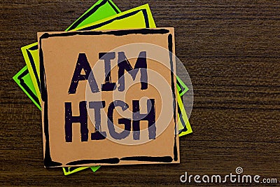 Word writing text Aim High. Business concept for go for best job school or activity Asking someone to dream big Paper notes Import Stock Photo