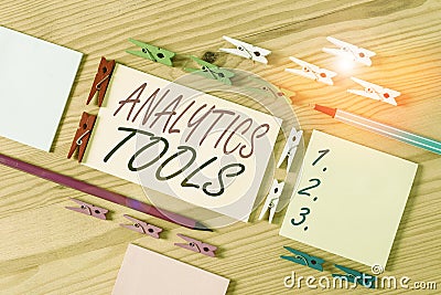 Word writing text Analytics Tools. Business concept for pieces of web application analysis software used to monitor Colored Stock Photo