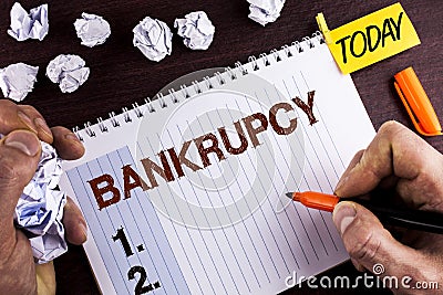 Word writing text Bankrupcy. Business concept for Company under financial crisis goes bankrupt with declining sales written by Man Stock Photo