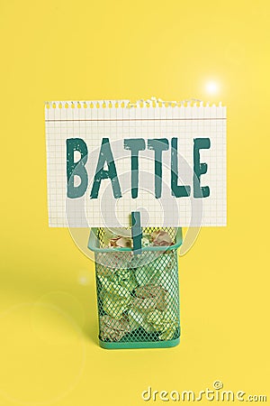 Word writing text Battle. Business concept for violent fight between groups of showing or between military forces Trash bin Stock Photo