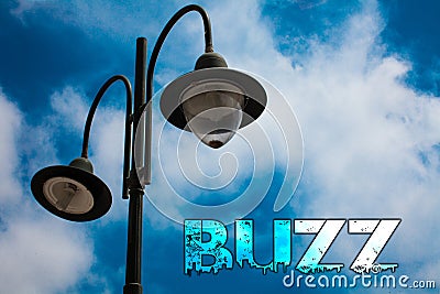 Word writing text Buzz. Business concept for Hum Murmur Drone Fizz Ring Sibilation Whir Alarm Beep Chime Light post blue cloudy cl Stock Photo