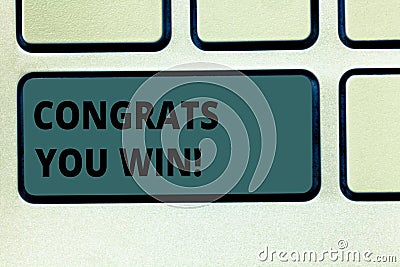 Word writing text Congrats You Win. Business concept for Congratulations for your accomplish competition winner Keyboard Stock Photo