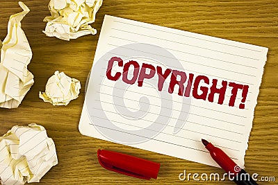 Word writing text Copyright Motivational Call. Business concept for Saying no to intellectual property piracy written on Tear Note Stock Photo