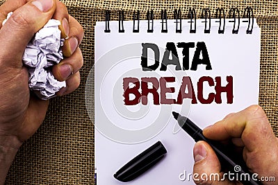 Word writing text Data Breach. Business concept for Stolen Cybercrime Information Hacking Security Malicious Crack written by Man Stock Photo