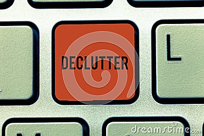 Word writing text Declutter. Business concept for remove unnecessary items from untidy or overcrowded place Keyboard key Stock Photo