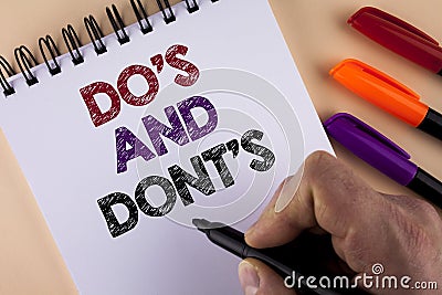 Word writing text Do'S And Don'Ts. Business concept for What can be done and what cannot be knowing right wrong written by Man w Stock Photo