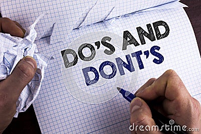 Word writing text Do'S And Don'Ts. Business concept for What can be done and what cannot be knowing right wrong written by Man o Stock Photo