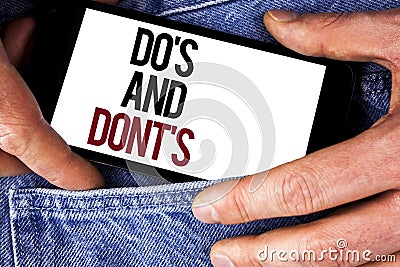 Word writing text Do'S And Don'Ts. Business concept for What can be done and what cannot be knowing right wrong written on Mobil Stock Photo