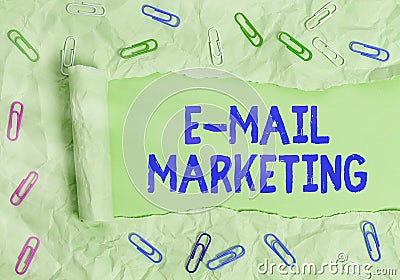 Word writing text Email Marketing. Business concept for Sending a commercial message to a group of showing using mail Stock Photo
