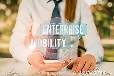 Word writing text Enterprise Mobility. Business concept for Employees do jobs remotely using a mobile devices Female Stock Photo