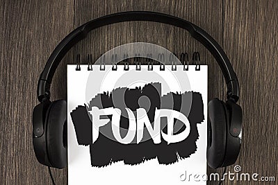 Word writing text Fund. Business concept for Large amount of money is released from bank for particular purpose written on Notepad Stock Photo