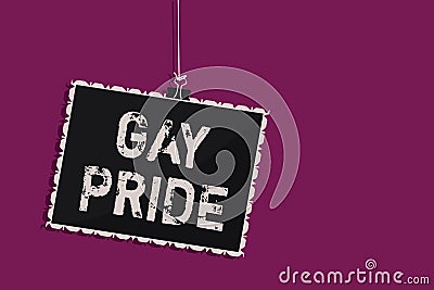 Word writing text Gay Pride. Business concept for Dignity of an idividual that belongs to either a man or woman Hanging blackboard Stock Photo