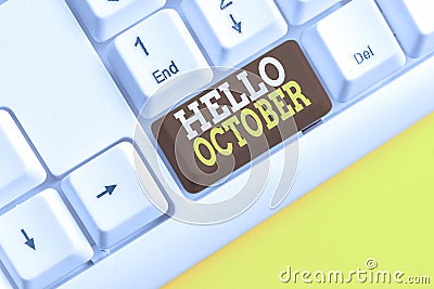 Word writing text Hello October. Business concept for Last Quarter Tenth Month 30days Season Greeting White pc keyboard Stock Photo