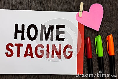 Word writing text Home Staging. Business concept for Act of preparing a private residence for sale in the market Open notebook pag Stock Photo