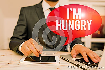 Word writing text I M Hungry. Business concept for having a strong wish or desire for something to put on stomach Male Stock Photo