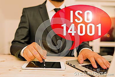 Word writing text Iso 14001. Business concept for a family of standards related to environmental analysisagement Male Stock Photo