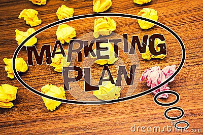 Word writing text Marketing Plan. Business concept for Business Advertising Strategies Market Successful Ideas Text wood desk crum Stock Photo