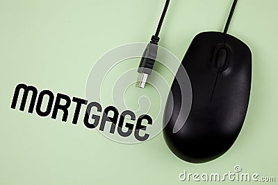 Word writing text Mortgage. Business concept for Conditional right of property to lender as warranty from loan written on Plain ba Stock Photo