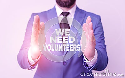 Word writing text We Need Volunteers. Business concept for someone who does work without being paid for it Man with opened hands Stock Photo