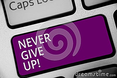 Word writing text Never Give Up. Business concept for Keep trying until you succeed follow your dreams goals Keyboard purple key I Stock Photo