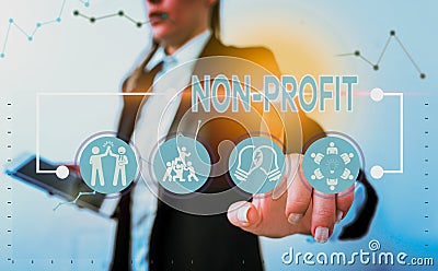 Word writing text Non Profit. Business concept for not making or conducted primarily to make profit organization. Stock Photo