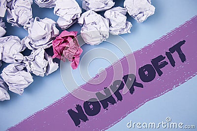 Word writing text Nonprofit. Business concept for Activities that do not generate revenues to the executor written on Painted back Stock Photo