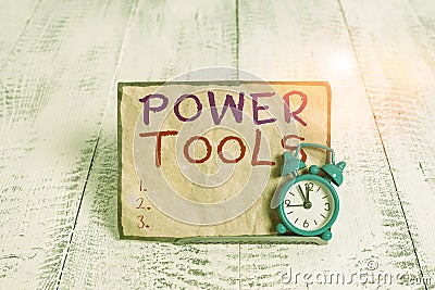 Word writing text Power Tools. Business concept for tool that is actuated by additional power source and mechanism Mini blue alarm Stock Photo