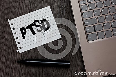 Word writing text Ptsd. Business concept for Post Traumatic Stress Disorder Mental Illness Trauma Fear Depression Laptop nice comp Stock Photo