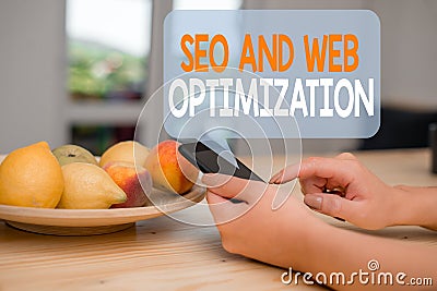 Word writing text Seo And Web Optimization. Business concept for Search Engine Keywording Marketing Strategies woman Stock Photo