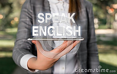 Word writing text Speak English. Business concept for Study another Foreign Language Online Verbal Courses Outdoor scene Stock Photo