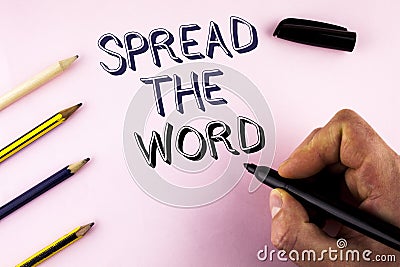 Word writing text Spread The Word. Business concept for Run advertisements to increase store sales many fold written by Man on pla Stock Photo