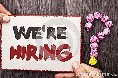 Word writing text Were Hiring. Business concept for Recruiting Hiring Now Recruitment Vacancy Announced Hire written on Cardboar Stock Photo