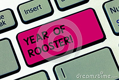 Word writing text Year Of Rooster. Business concept for Chinese horoscope zodiac sign China traditional celebration Keyboard key Stock Photo