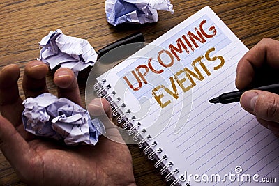 Word, writing Upcoming Events. Concept for Appointment Agenda List written on notebook notepad note paper on the wooden background Stock Photo