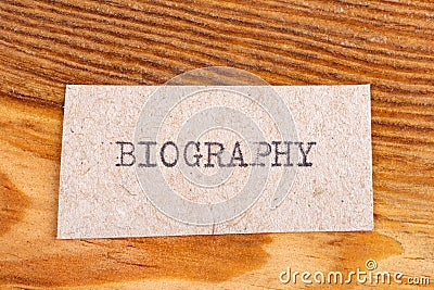 The word "biography" typed. The inscription on a gray sheet of pappier Stock Photo