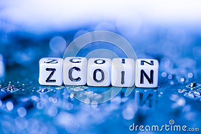 Word ZCOIN formed by alphabet blocks on mother cryptocurrency Stock Photo