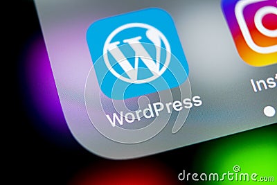 Wordpress application icon on Apple iPhone X screen close-up. Wordpress app icon. Wordpress.com application. Social network Editorial Stock Photo