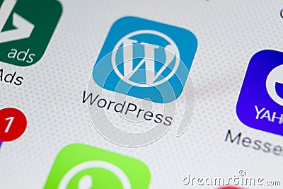 Wordpress application icon on Apple iPhone X screen close-up. Wordpress app icon. Wordpress.com application. Social network Editorial Stock Photo