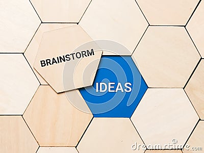 Words brainstorm and ideas on wooden hexagon. Business innovation concept. Stock Photo
