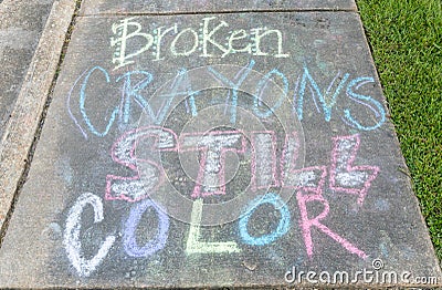 The words "Broken crayons still color" motivational phrase Stock Photo