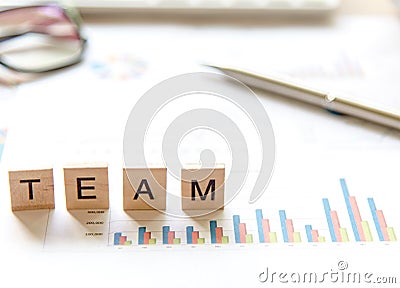 Words of business Team concepts collected in crossword with wooden cubes, select focus. Stock Photo