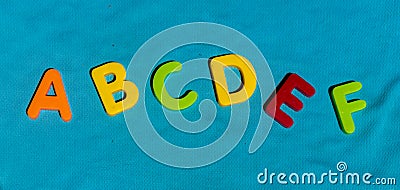 Colorful toy letters alphabet in order ABCDEF Stock Photo