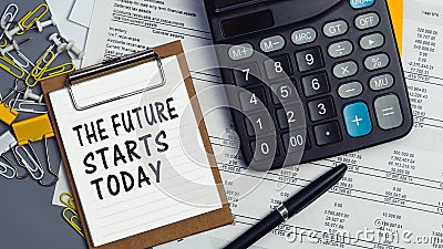 The words The future starts today written on a white notebook Stock Photo