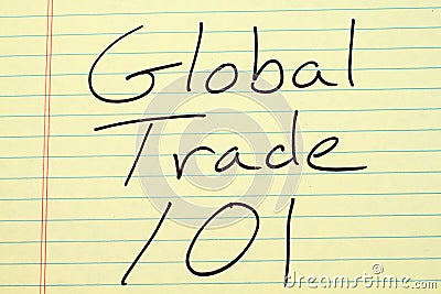 Global Trade 101 On A Yellow Legal Pad Stock Photo
