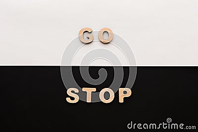 Words Go and Stop on contrast background Stock Photo